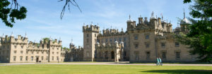 view of floors castle through the trees